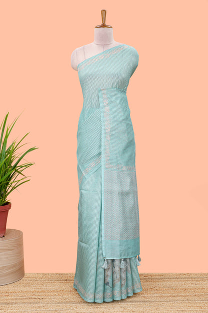 Green kota cotton saree featuring crane bird motif print and contrast pallu