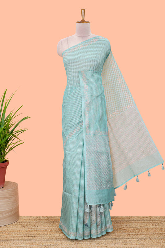Green kota cotton saree featuring crane bird motif print and contrast pallu