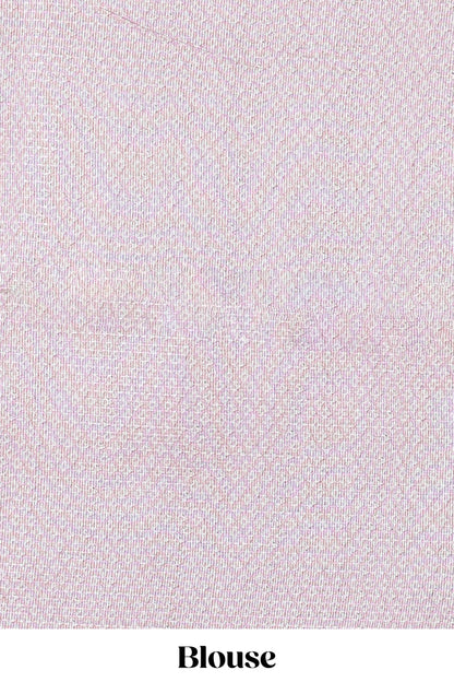 Pink kota cotton saree featuring crane bird motif print and contrast pallu