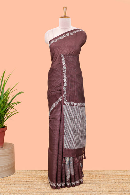 Brown kota cotton saree featuring crane bird motif print and contrast pallu