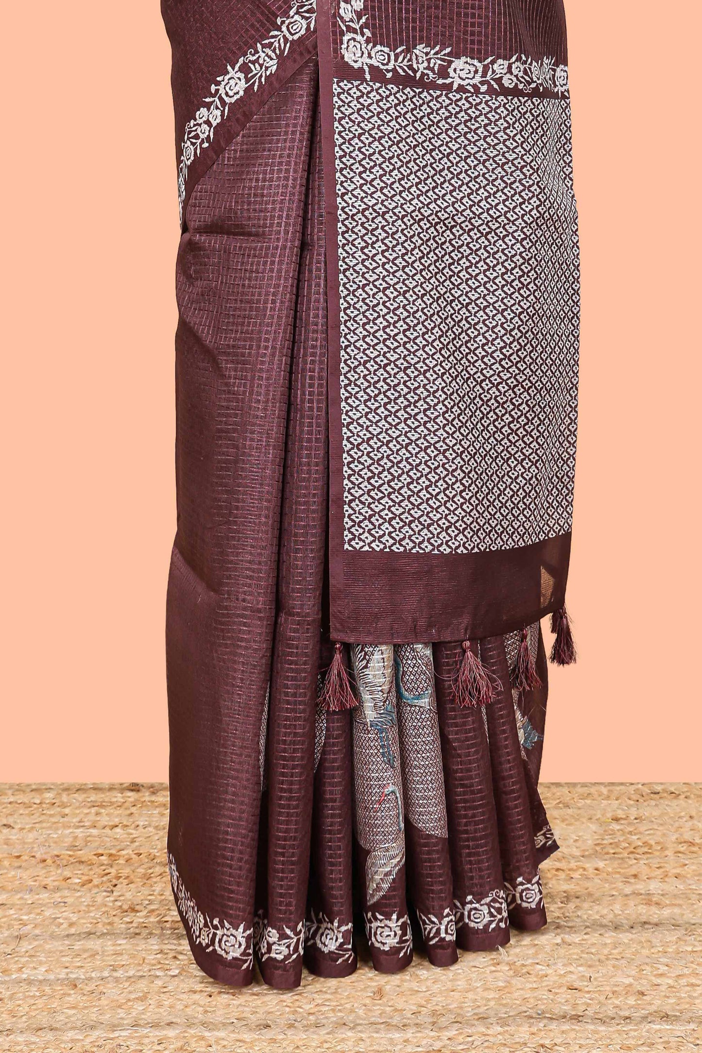 Brown kota cotton saree featuring crane bird motif print and contrast pallu