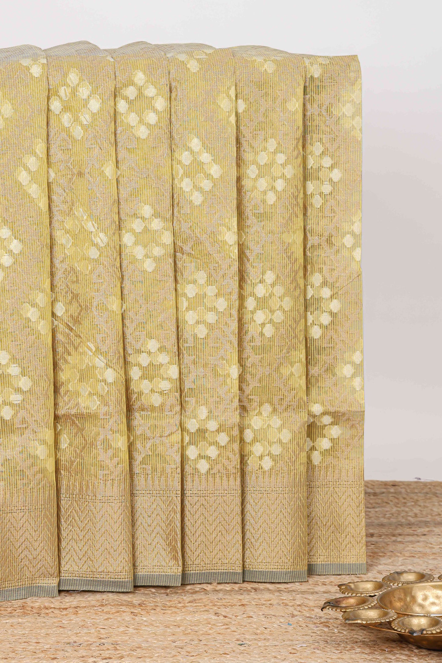 Lime green geometric zari weaving kota cotton saree with zig zag zari border and pallu