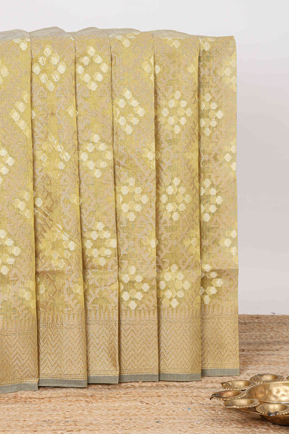 Lime green geometric zari weaving kota cotton saree with zig zag zari border and pallu