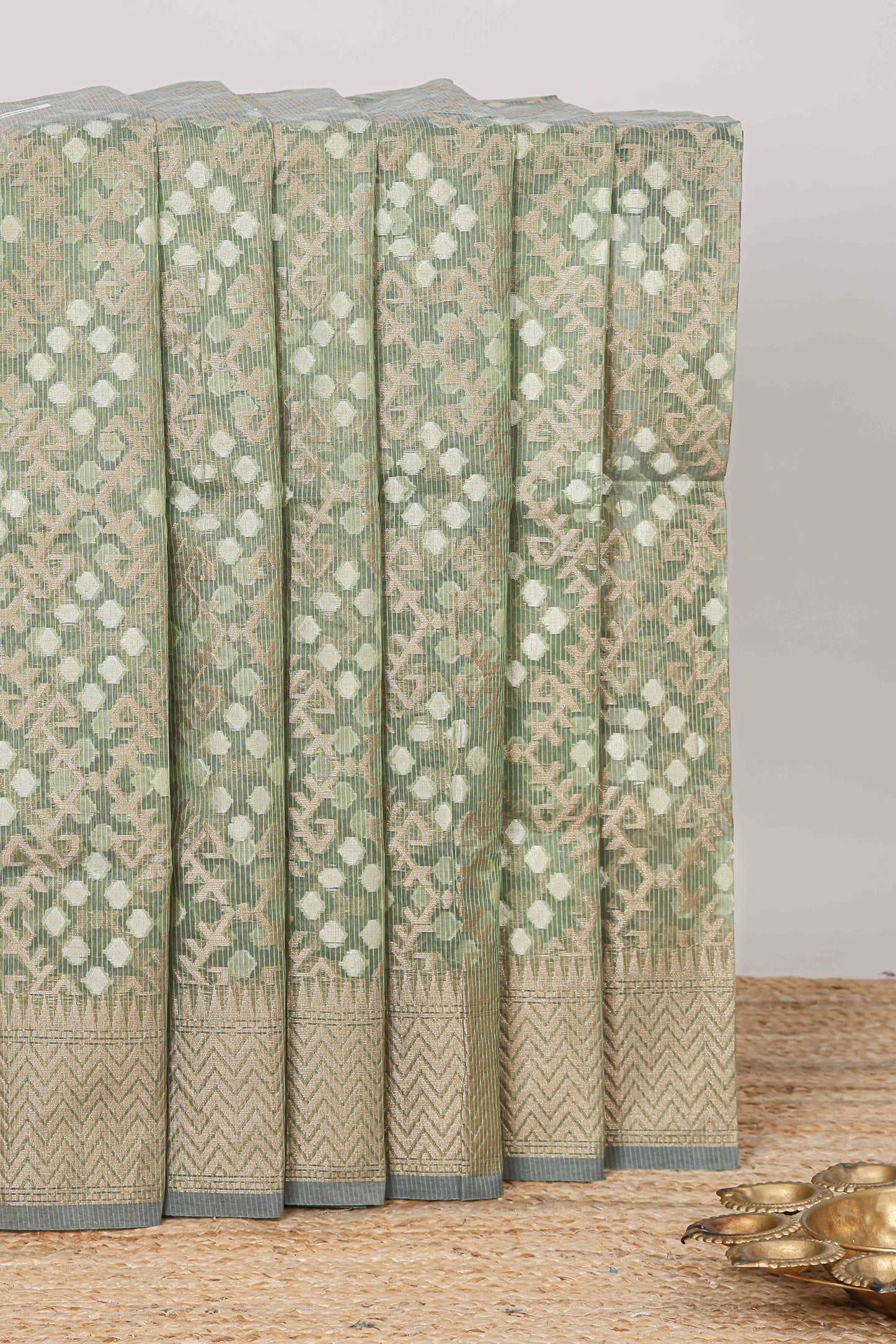 Green geometric zari weaving kota cotton saree with zig zag zari border and pallu