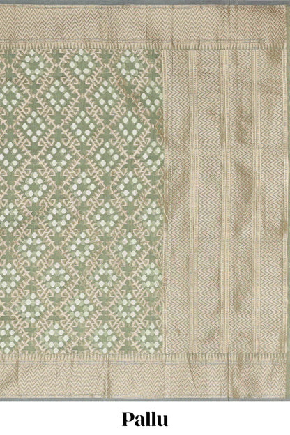 Green geometric zari weaving kota cotton saree with zig zag zari border and pallu