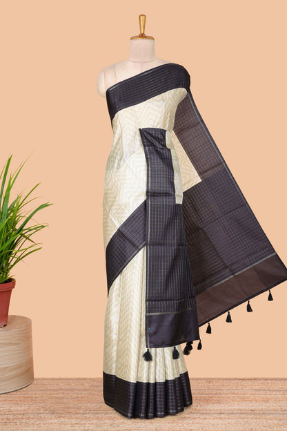 Sandal zig zag art tussar silk saree with contrast checked zari border and pallu