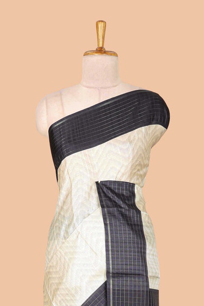 Sandal zig zag art tussar silk saree with contrast checked zari border and pallu