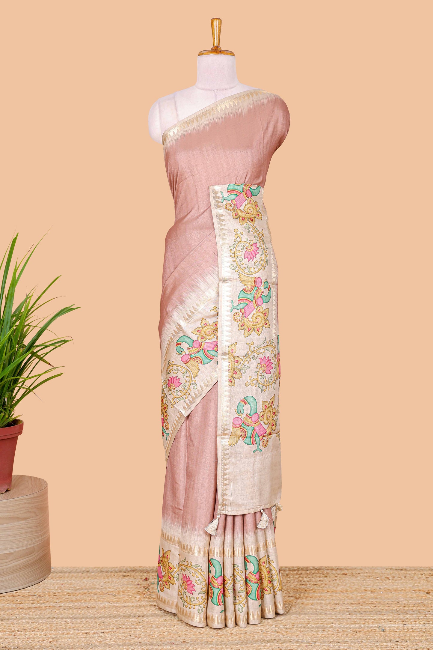 Peach plain art tussar silk saree with contrast peacock and lotus theme border and printed pallu