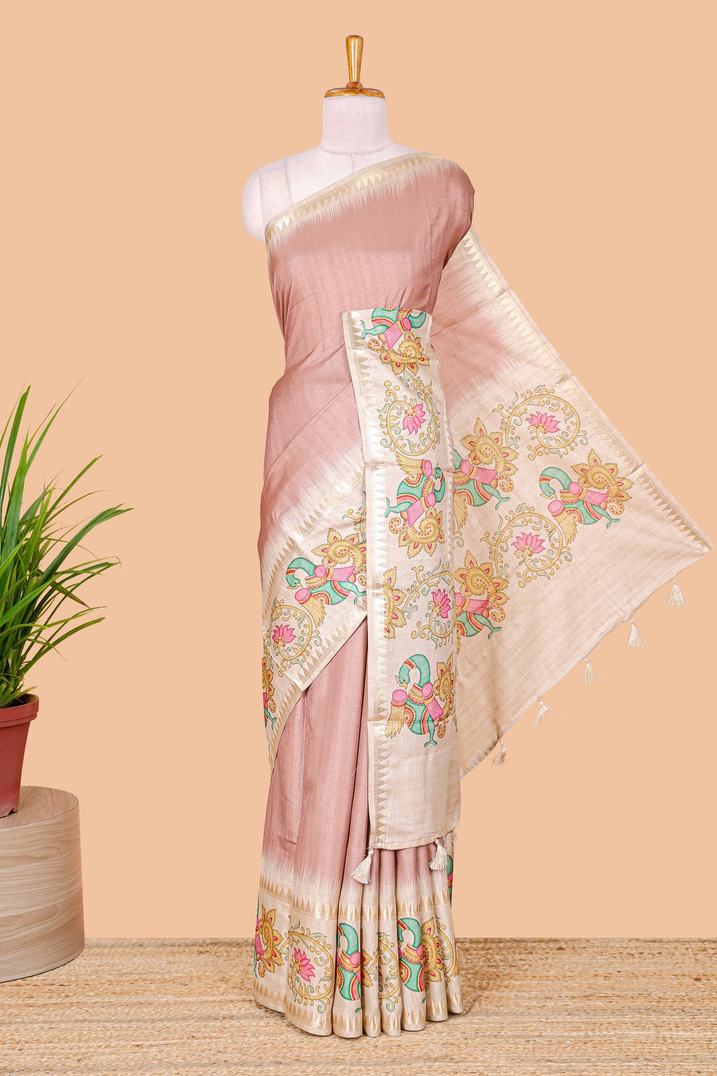 Peach plain art tussar silk saree with contrast peacock and lotus theme border and printed pallu