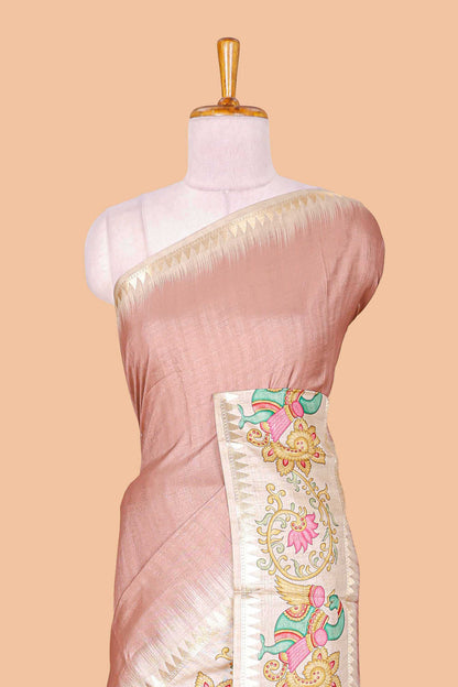 Peach plain art tussar silk saree with contrast peacock and lotus theme border and printed pallu