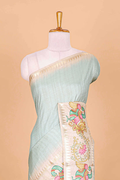 Blue plain art tussar silk saree with contrast peacock and lotus theme border and printed pallu