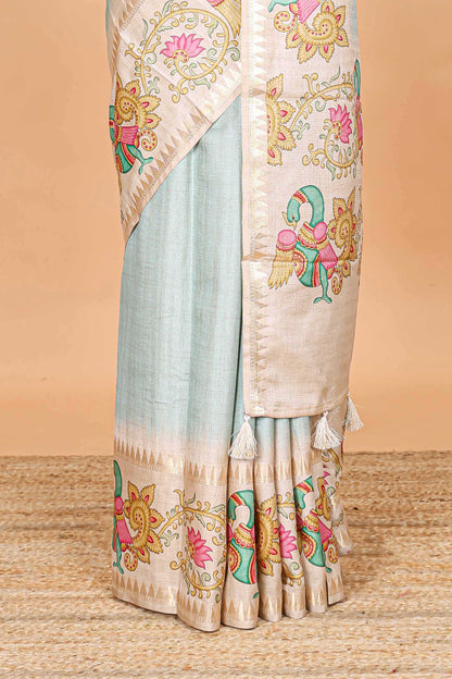 Blue plain art tussar silk saree with contrast peacock and lotus theme border and printed pallu