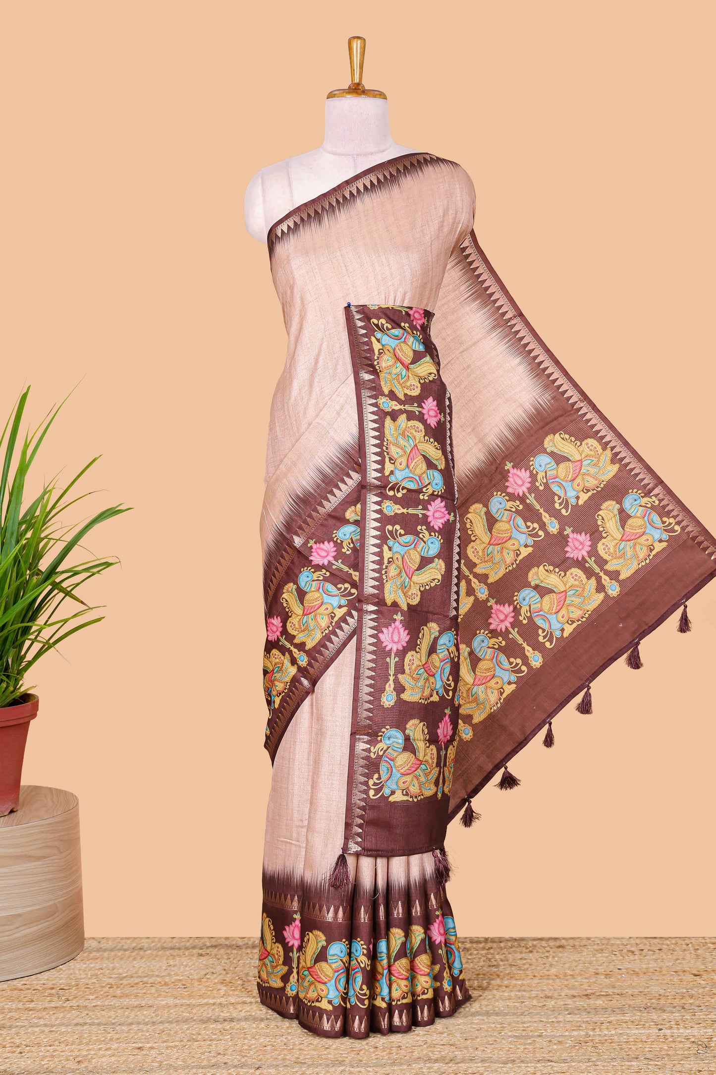 Peach plain art tussar silk saree with contrast annam bird and lotus theme border and printed pallu