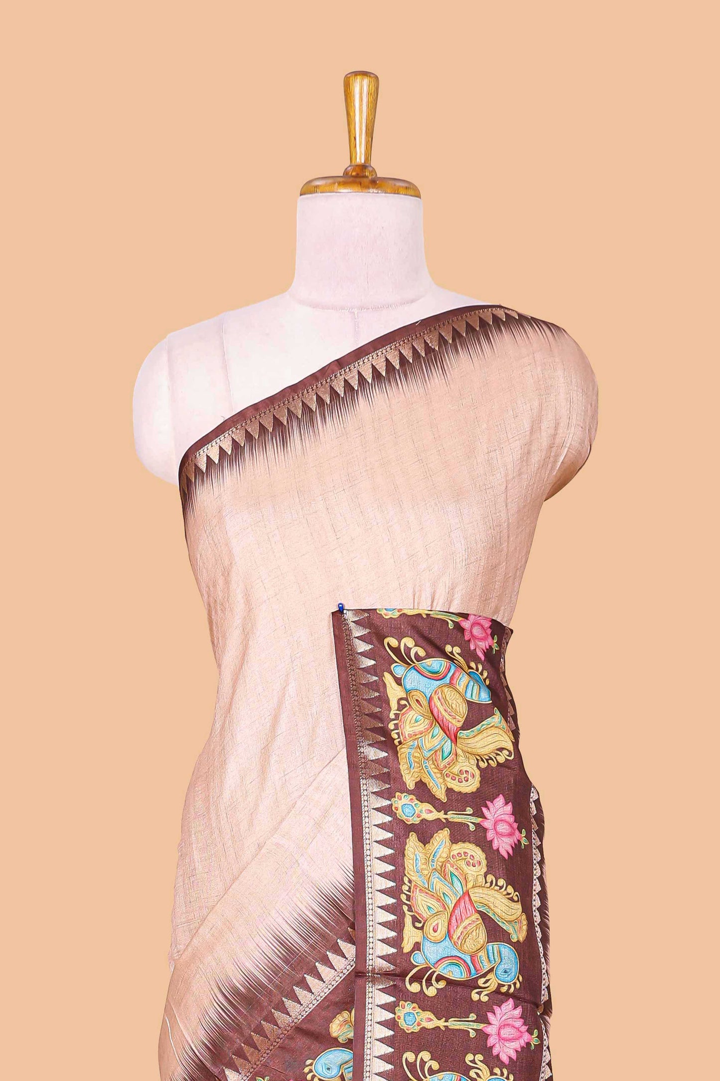 Peach plain art tussar silk saree with contrast annam bird and lotus theme border and printed pallu