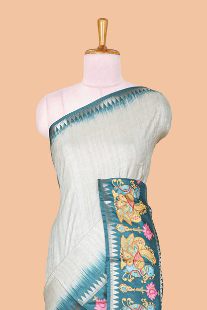 Green plain art tussar silk saree with contrast annam bird and lotus theme border and printed pallu