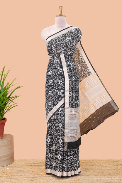 Black assam silk saree with all over ikkat style print, stripe pallu and zari border