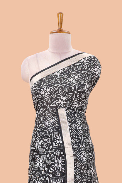 Black assam silk saree with all over ikkat style print, stripe pallu and zari border