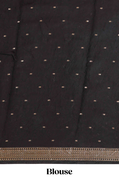 Black assam silk saree with all over ikkat style print, stripe pallu and zari border