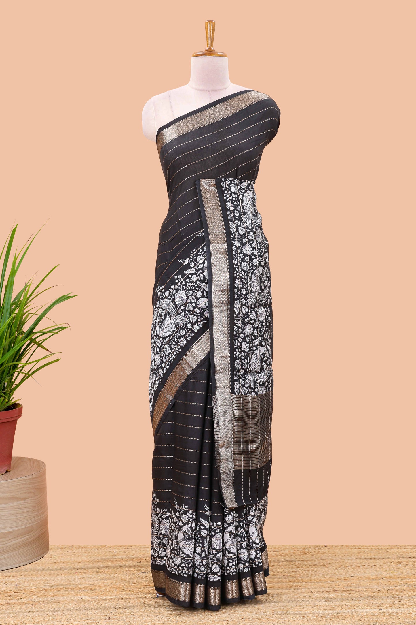 Black striped assam silk saree with kalamkari style and floral vine print, self zari border and pallu