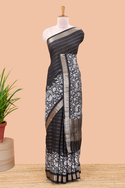 Black striped assam silk saree with kalamkari style and floral vine print, self zari border and pallu