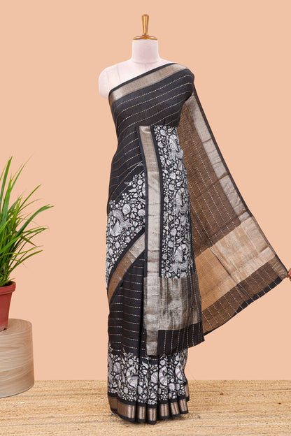 Black striped assam silk saree with kalamkari style and floral vine print, self zari border and pallu