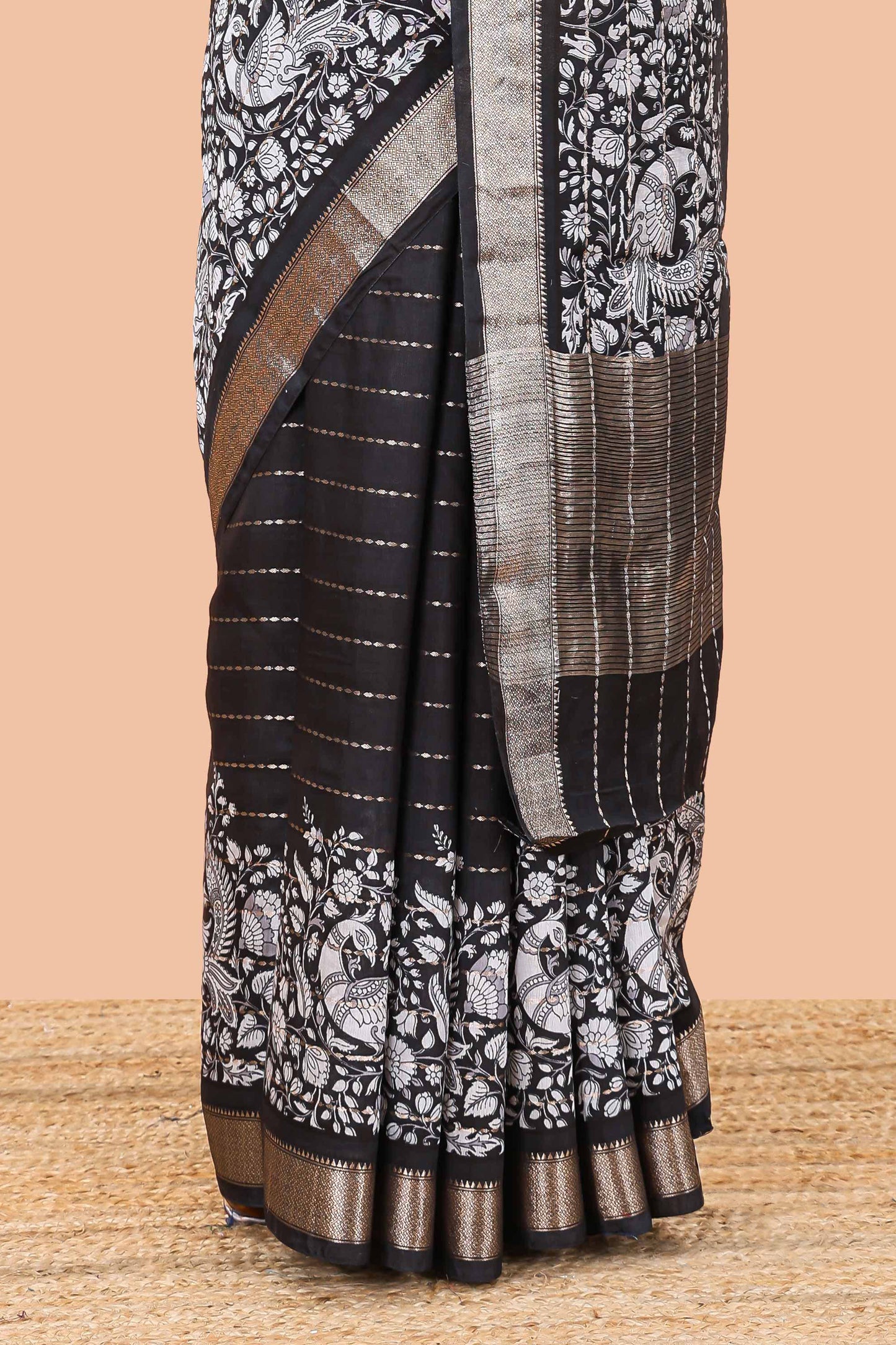 Black striped assam silk saree with kalamkari style and floral vine print, self zari border and pallu