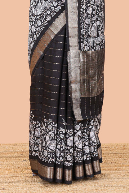 Black striped assam silk saree with kalamkari style and floral vine print, self zari border and pallu