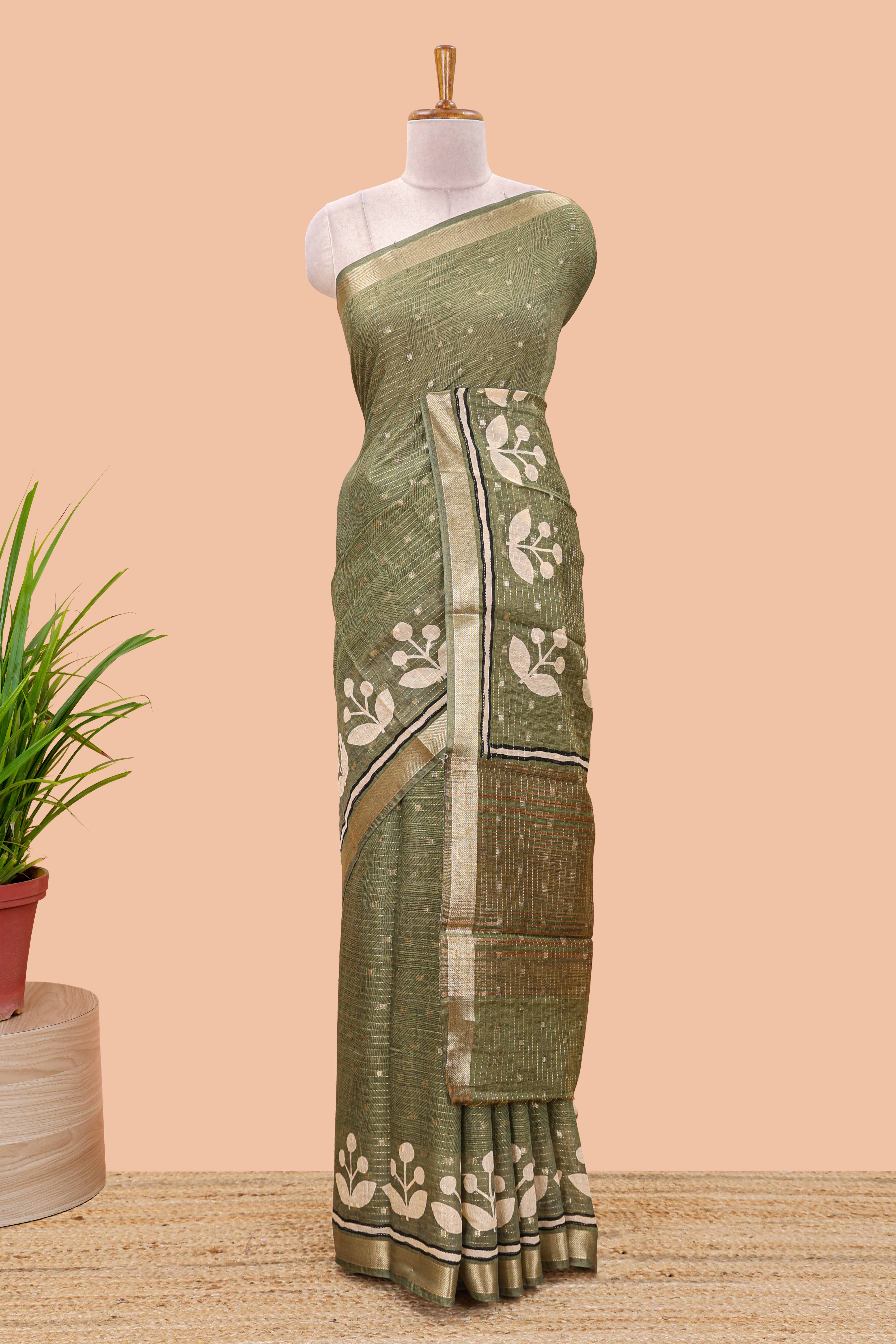 Green striped assam silk saree with small zari butta, botanical block print and zari striped pallu