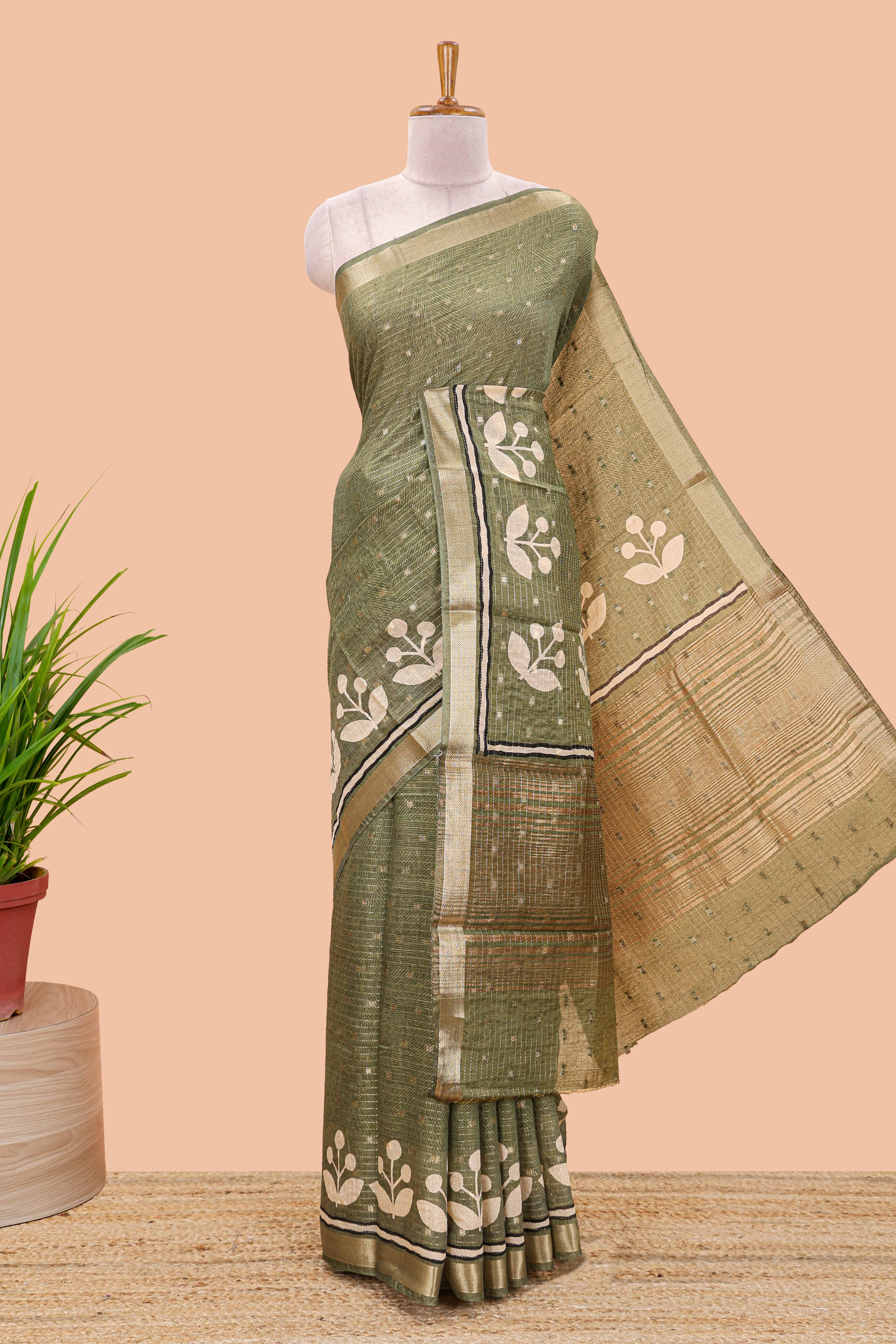 Green striped assam silk saree with small zari butta, botanical block print and zari striped pallu
