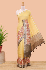 Mustard assam silk saree with zari check, floral & peacock motifs, kalamkari print border and striped pallu