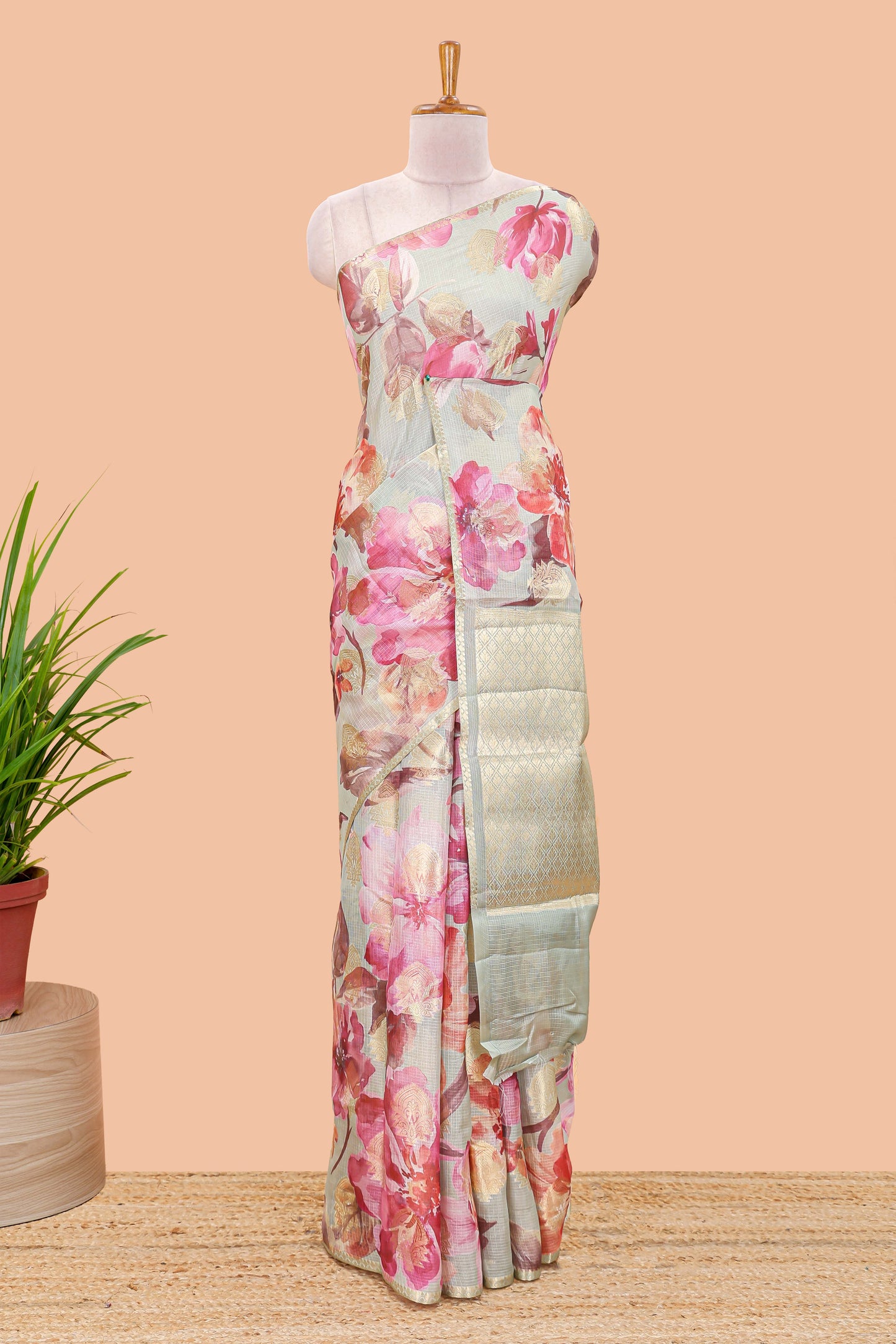 Green kota silk saree with zari butta and digital floral print pallu