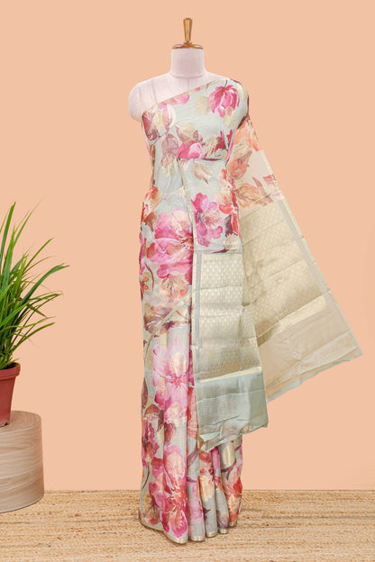 Green kota silk saree with zari butta and digital floral print pallu