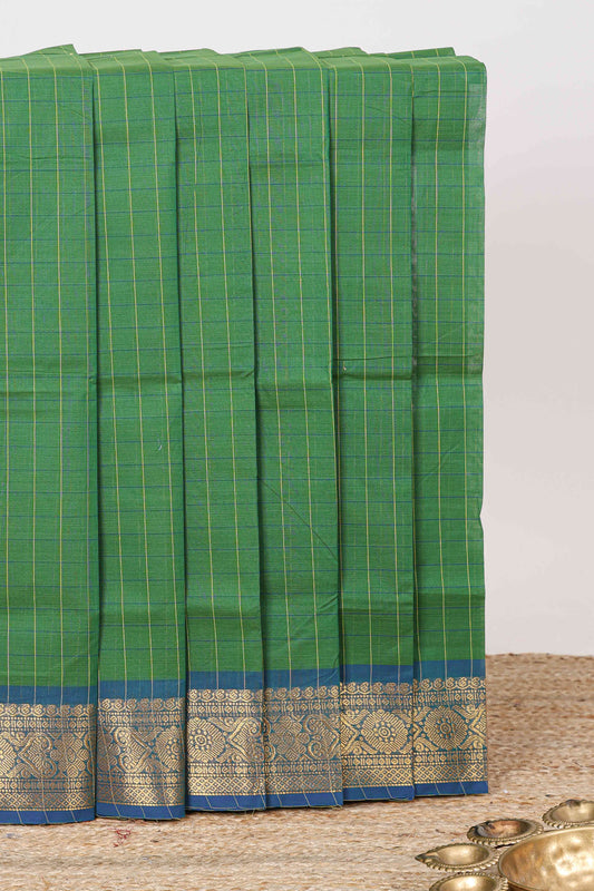 Green checked chettinad cotton saree with contrast zari border and striped pallu