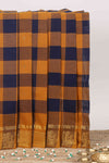 Multicolor checked butta chettinad cotton saree with self border and matching zari striped pallu