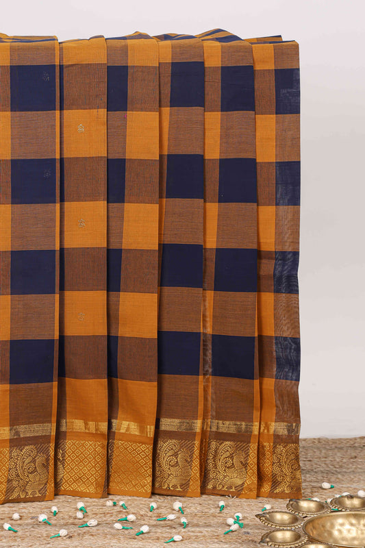 Multicolor checked butta chettinad cotton saree with self border and matching zari striped pallu