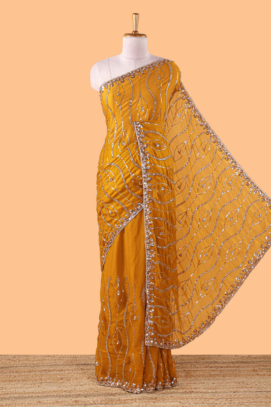 Mustard wave pattern chamki work all over body designer saree with scallop design border matching blouse