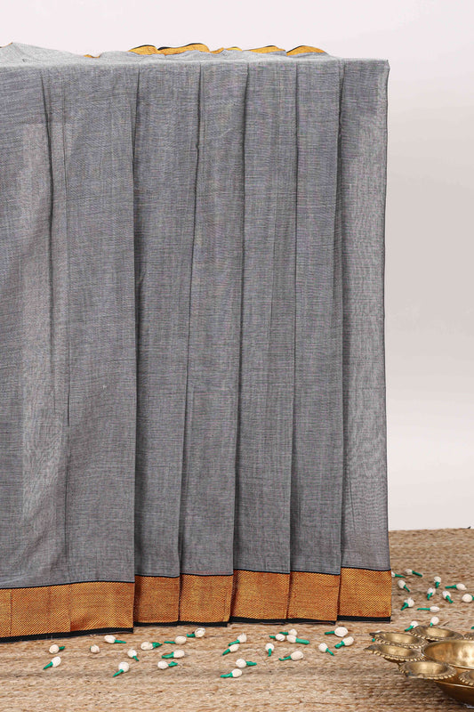 Grey plain narayanpet cotton saree with contrast border and striped pallu