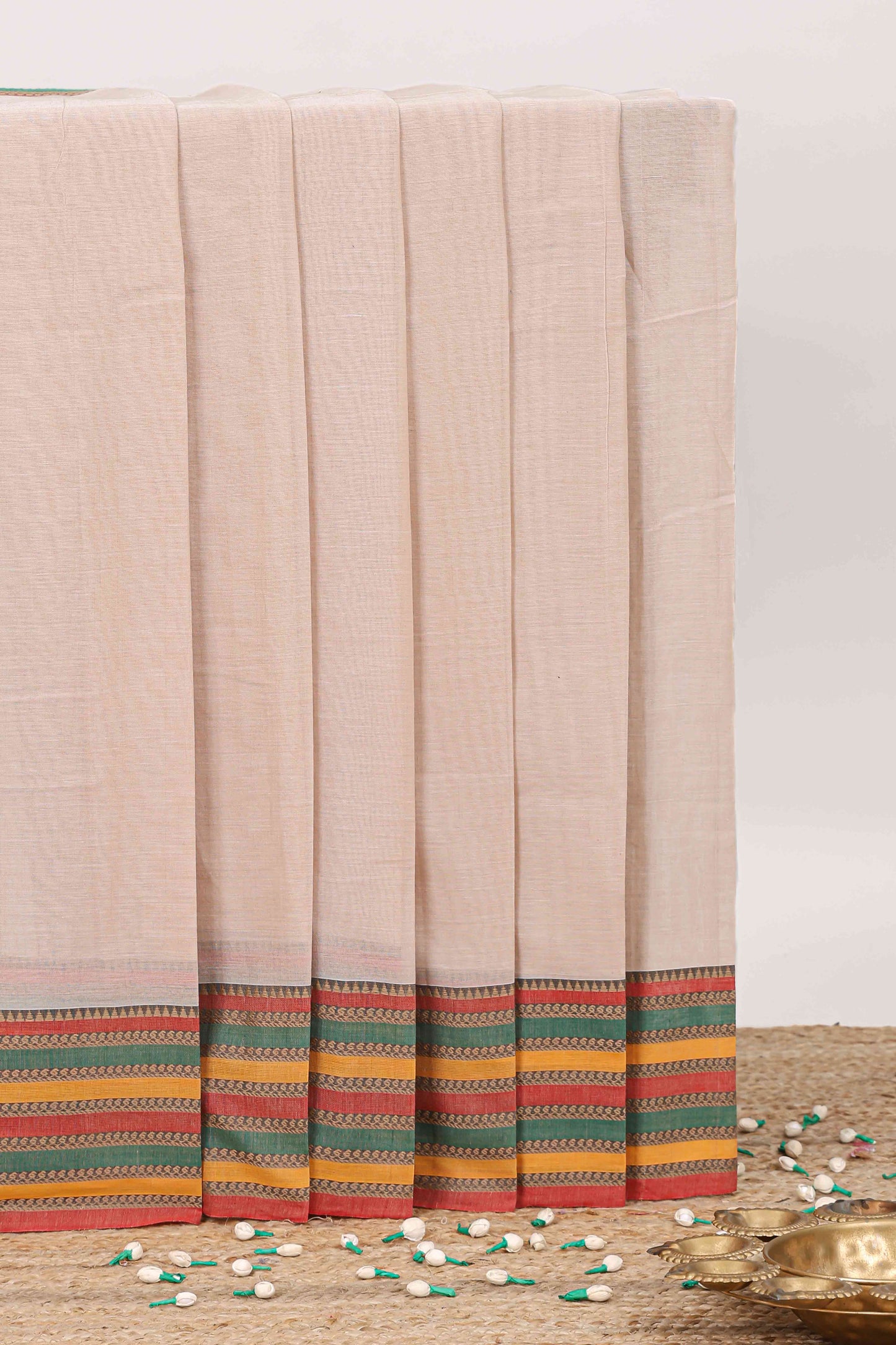 Beige plain narayanpet cotton saree with contrast border and striped pallu