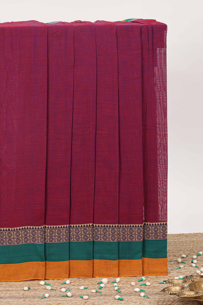 Maroon plain narayanpet cotton saree with contrast border and striped pallu