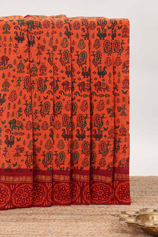 Orange warli print sungudi cotton saree with contrast border and printed pallu