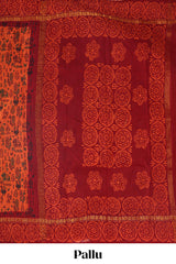 Orange warli print sungudi cotton saree with contrast border and printed pallu
