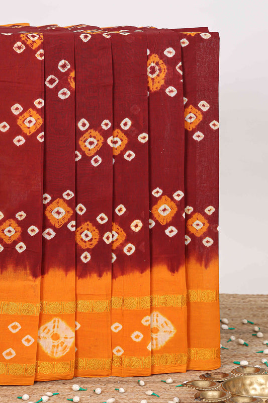 Maroon bandhini style tie and dye sungudi cotton saree with contrast zari border and pallu