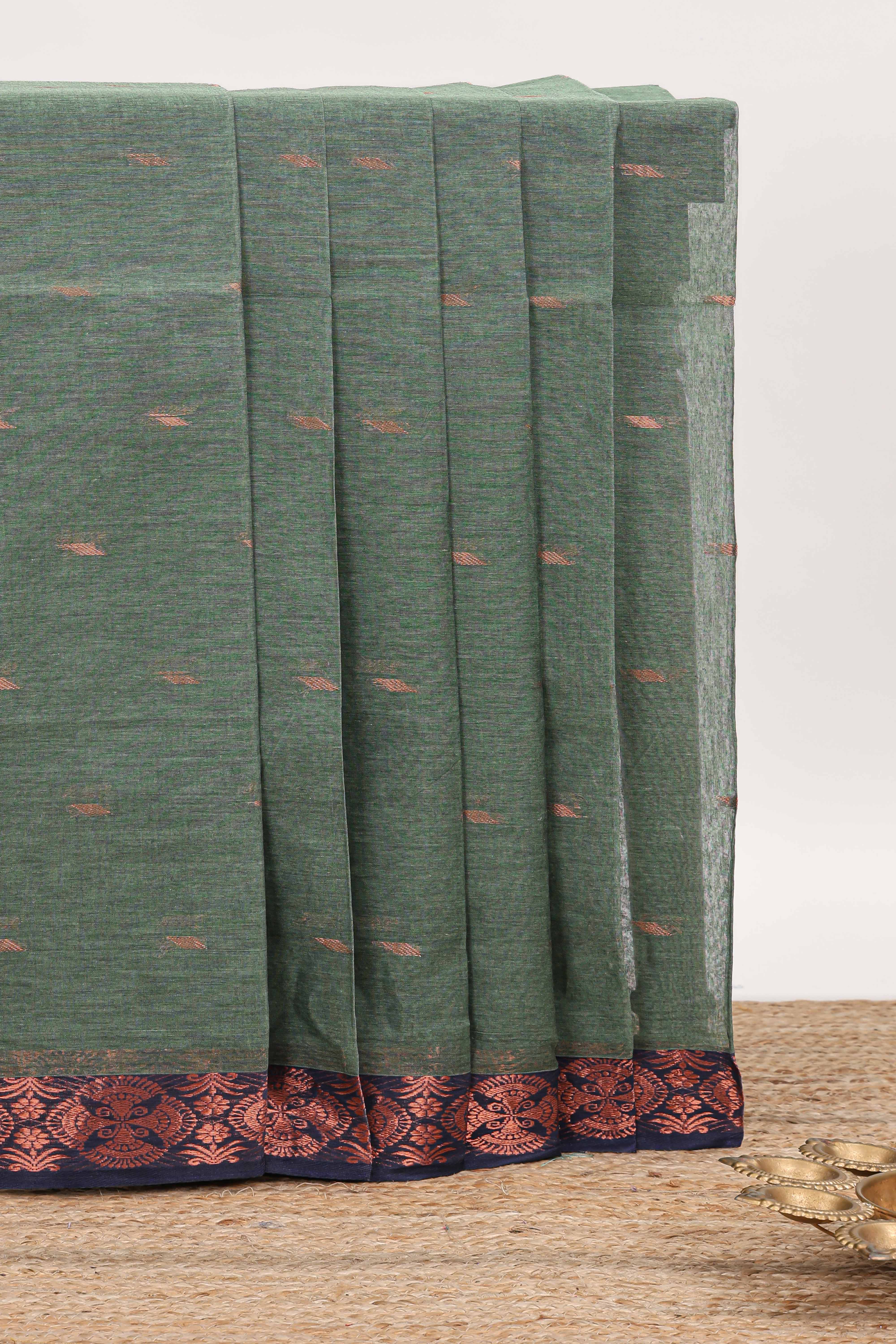 Dark green butta design bengal cotton saree with contrast border and matching pallu
