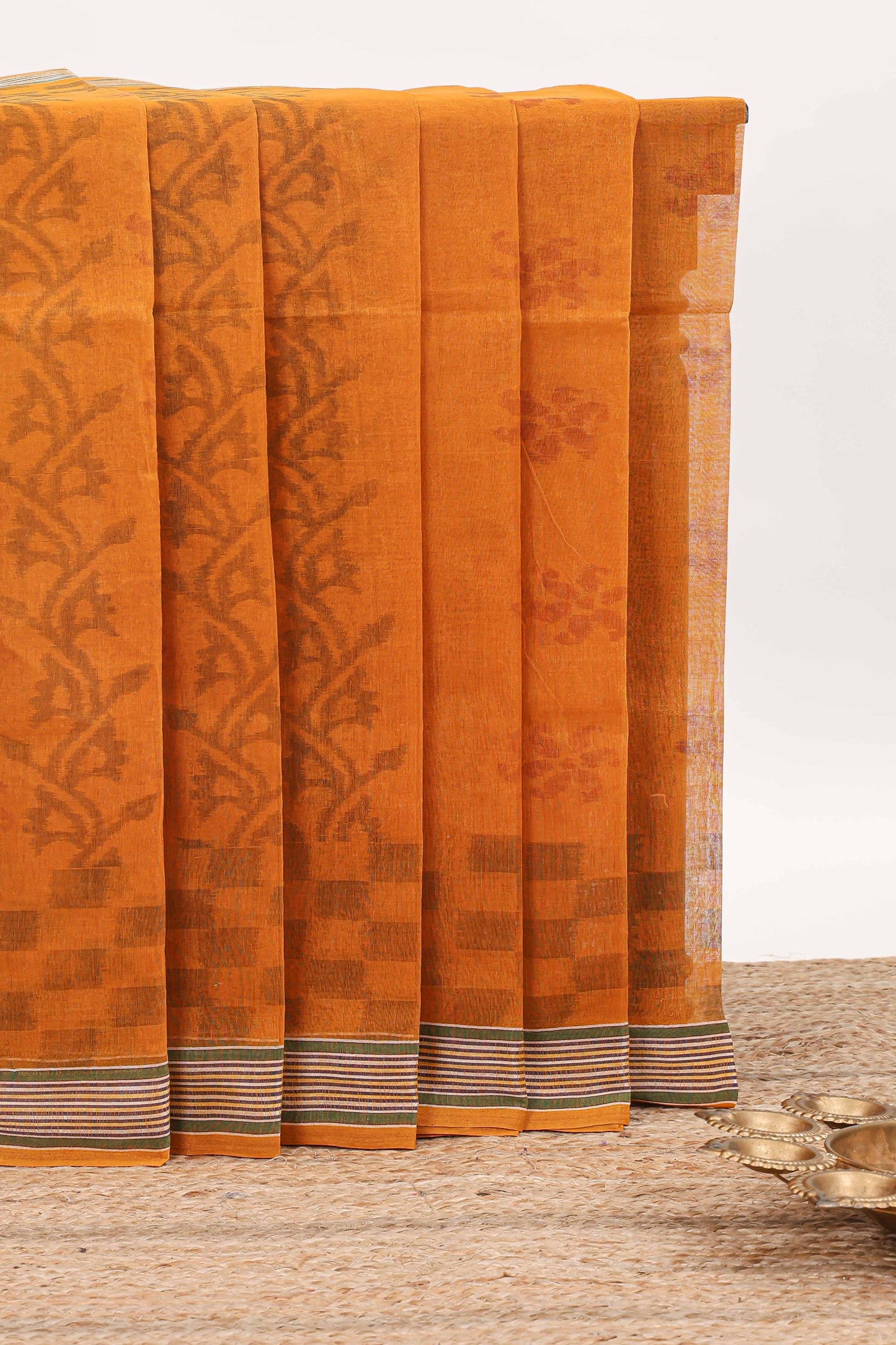Orange floral design bengal cotton saree with self border and matching pallu