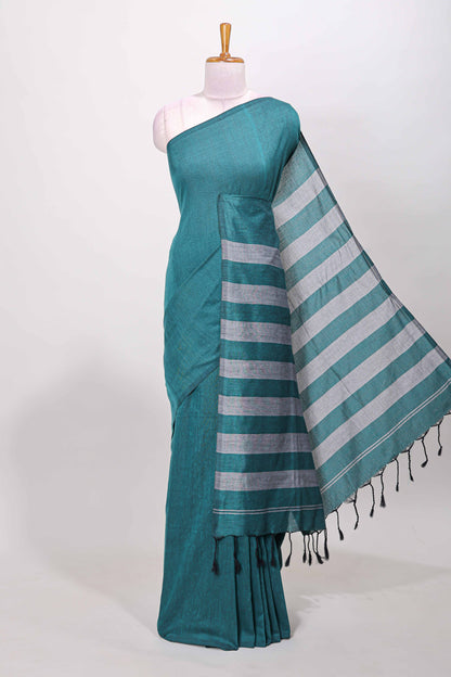 Borderless green plain south cotton saree with contrast striped pallu and matching blouse