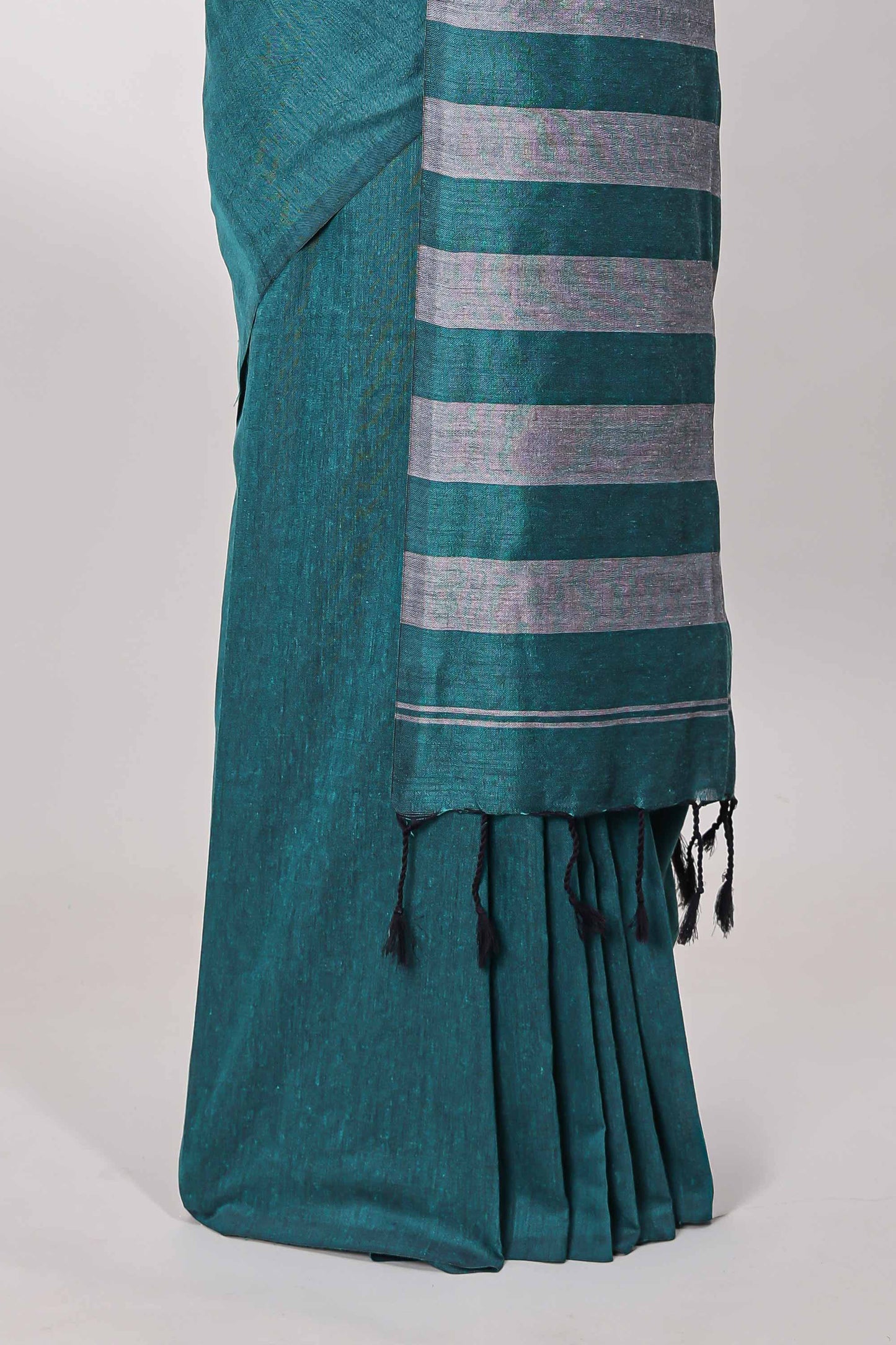 Borderless green plain south cotton saree with contrast striped pallu and matching blouse