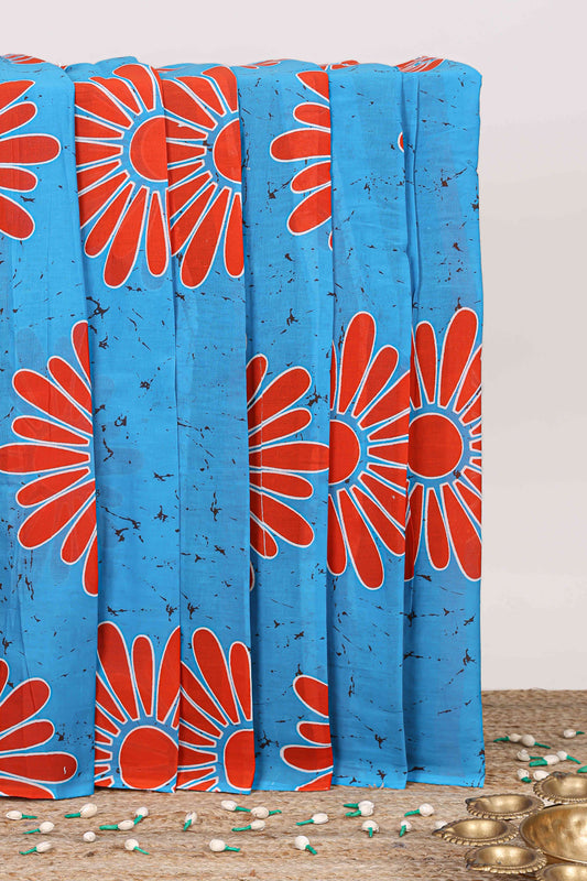 Borderless floral motifs mul mul cotton saree with multi color striped pallu and contrast blouse