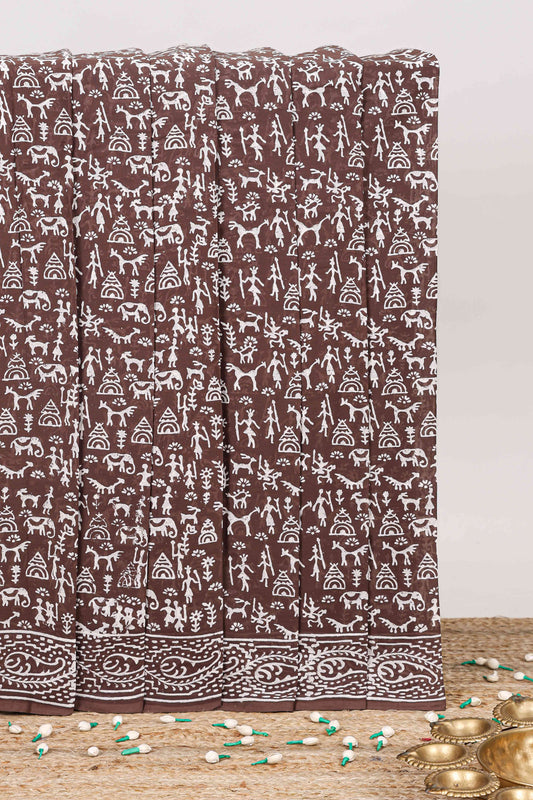 Brown warli print mul mul cotton saree with self design pallu and matching blouse