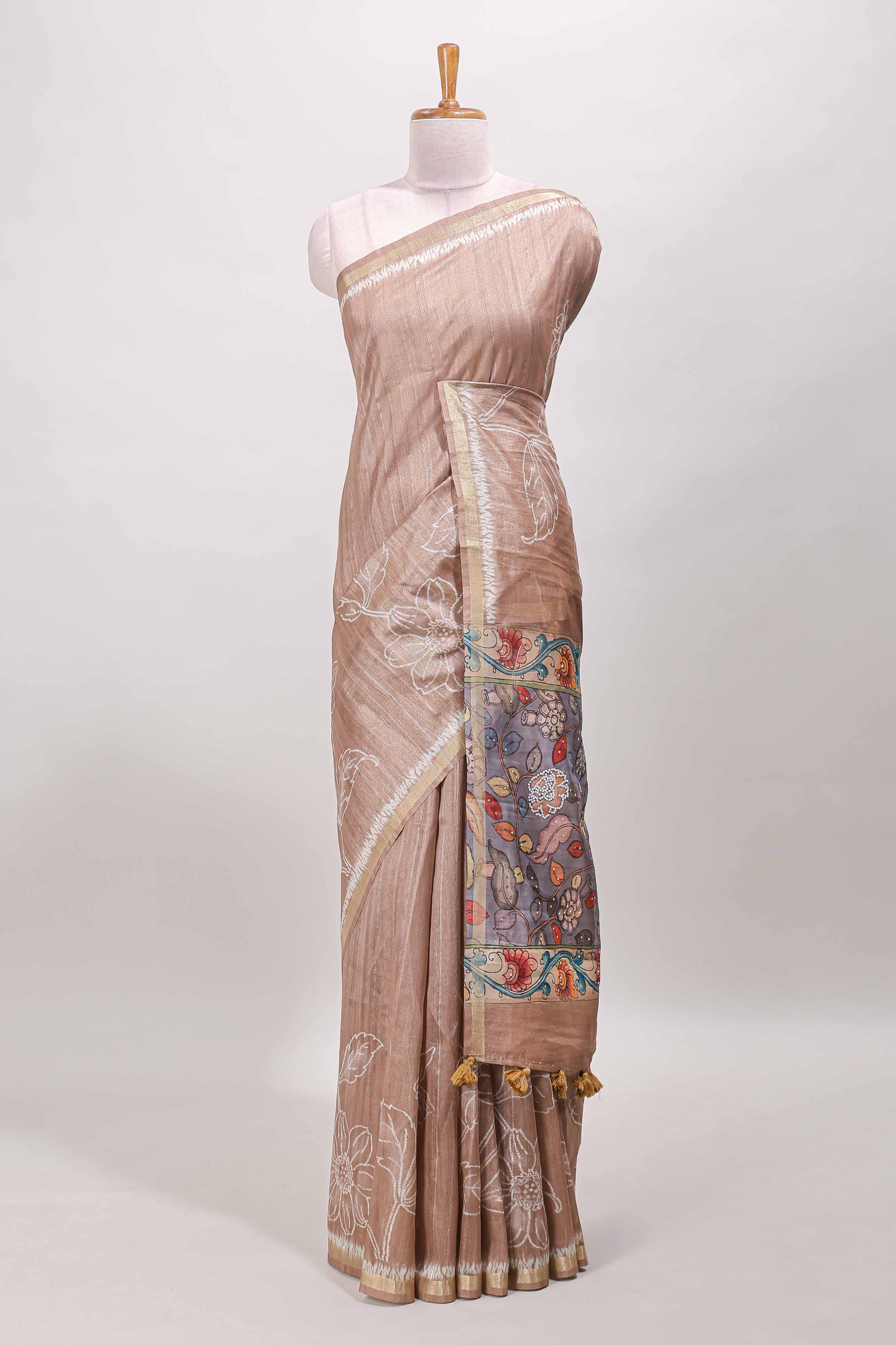 Brown floral design art tussar saree with self zari border and contrast floral print pallu