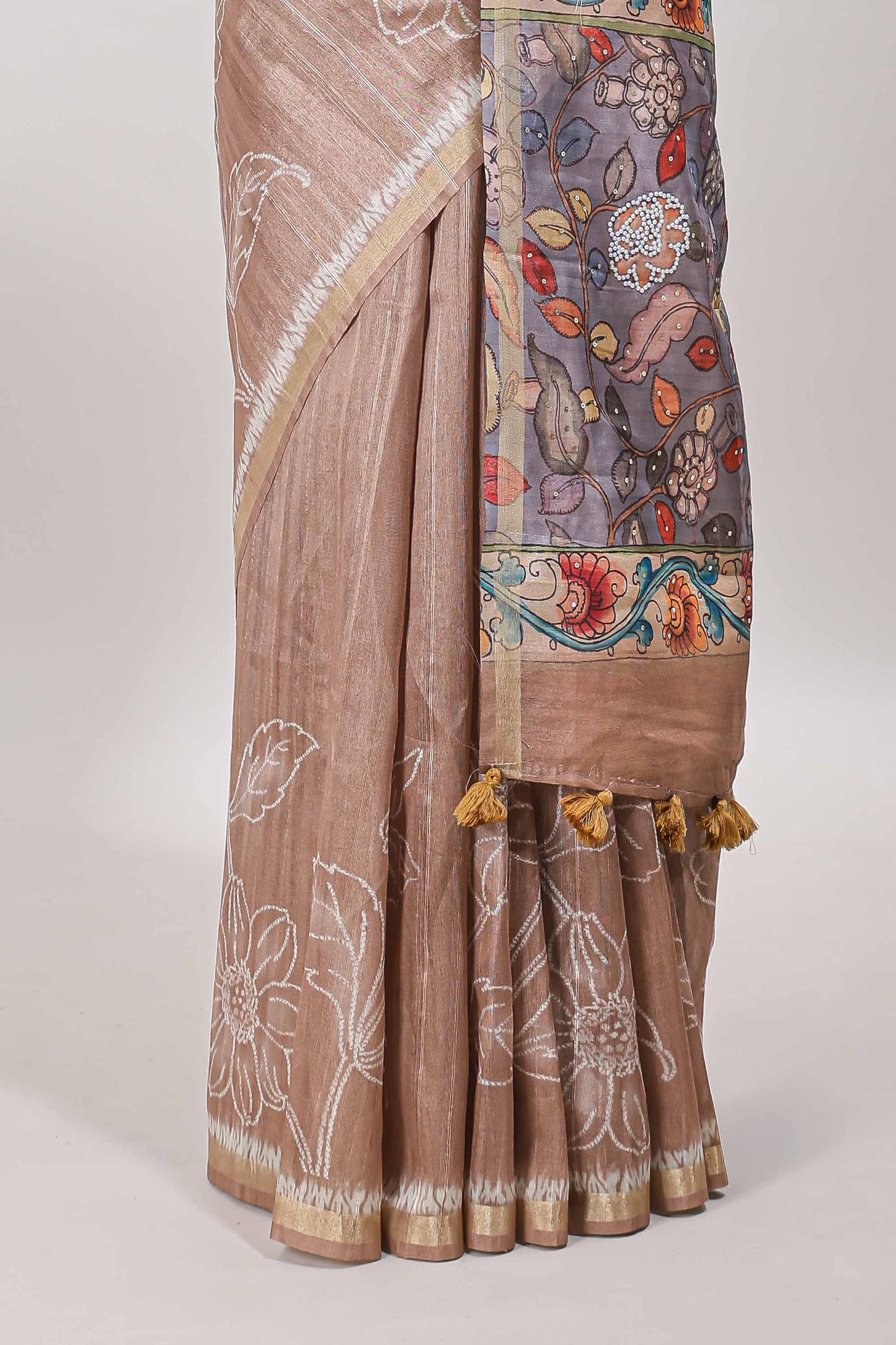 Brown floral design art tussar saree with self zari border and contrast floral print pallu